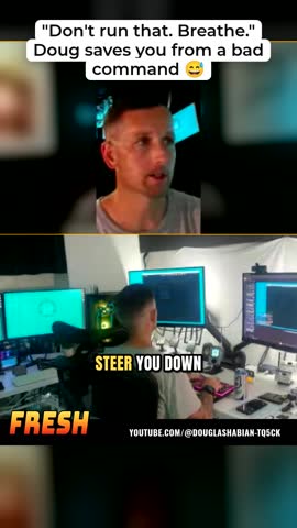 Delivered Short: the streamer reacting above his desk setup.